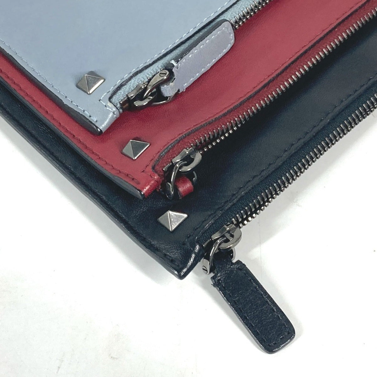 Rockstud Triple Zip Clutch Leather