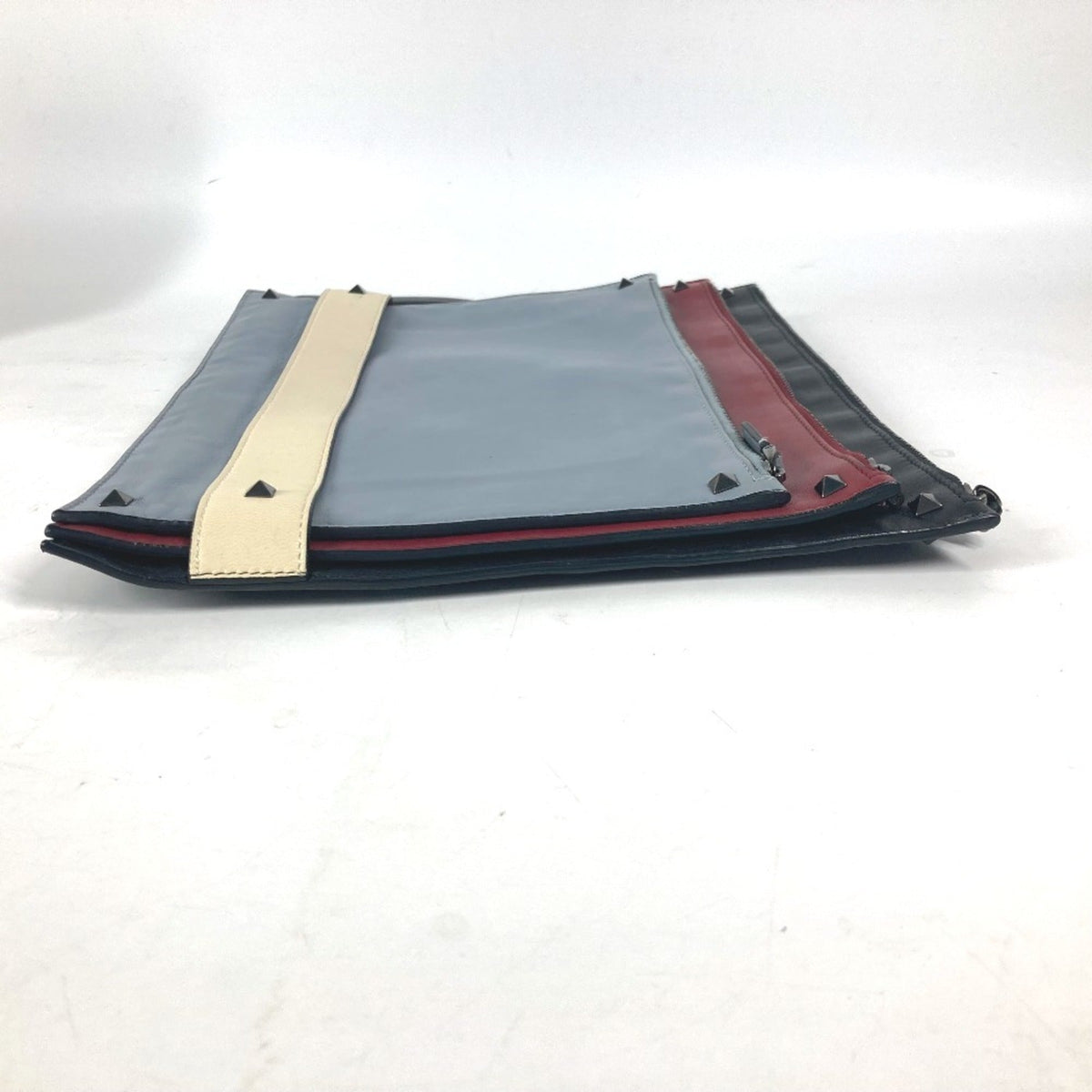 Rockstud Triple Zip Clutch Leather