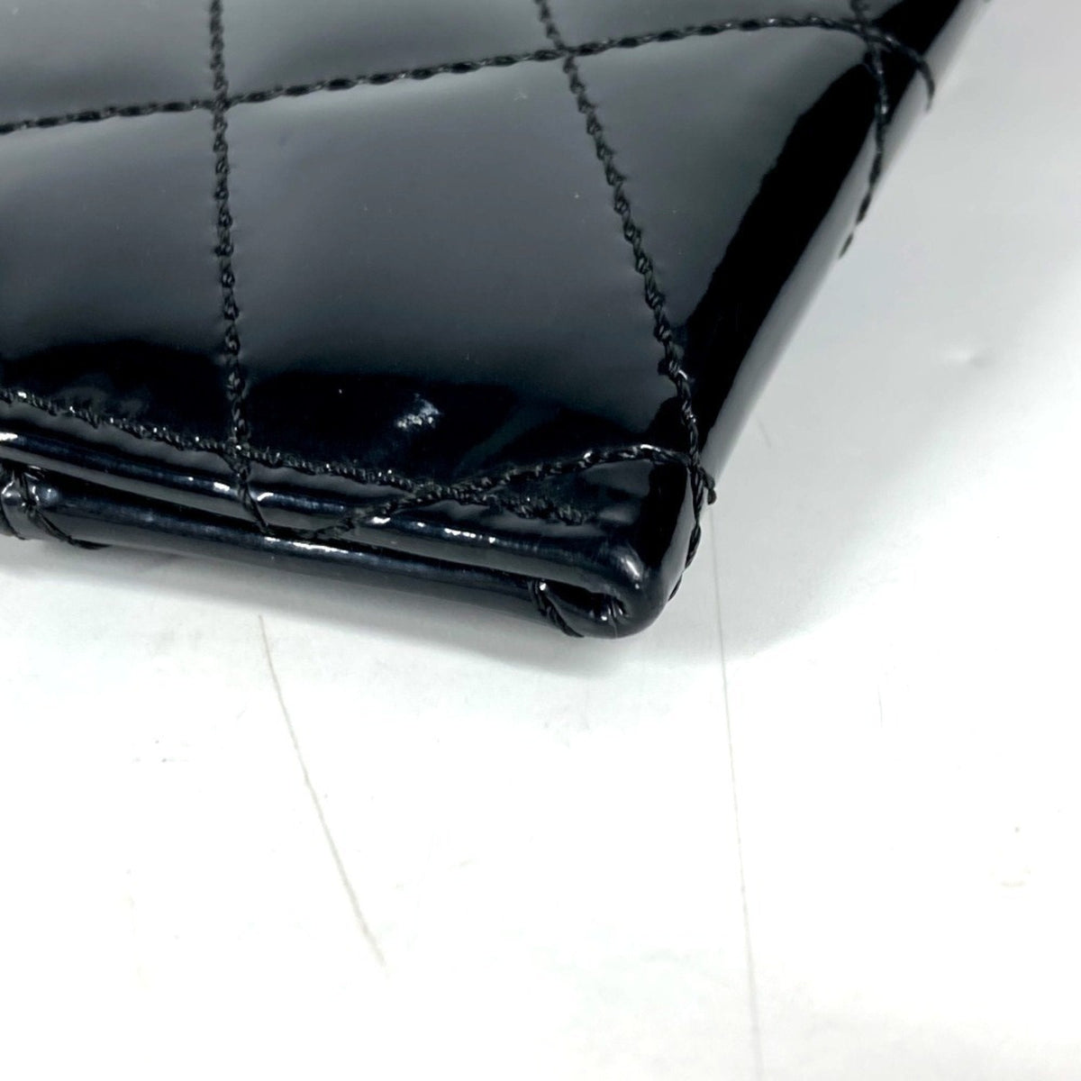Kaleidoscope Clutch Quilted Patent Medium