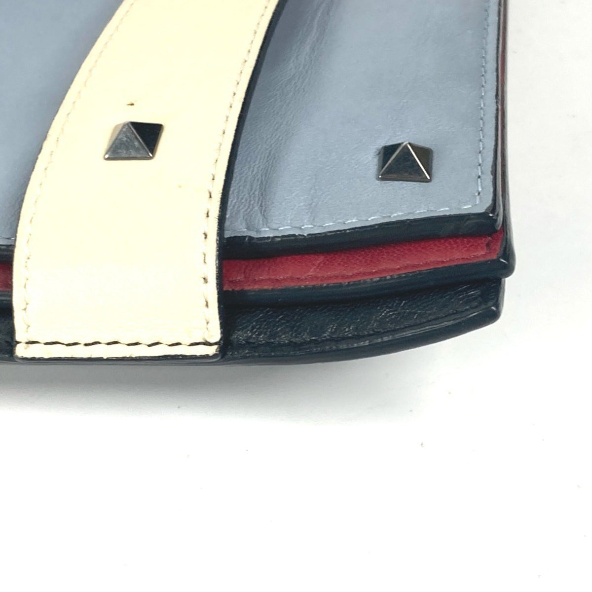 Rockstud Triple Zip Clutch Leather