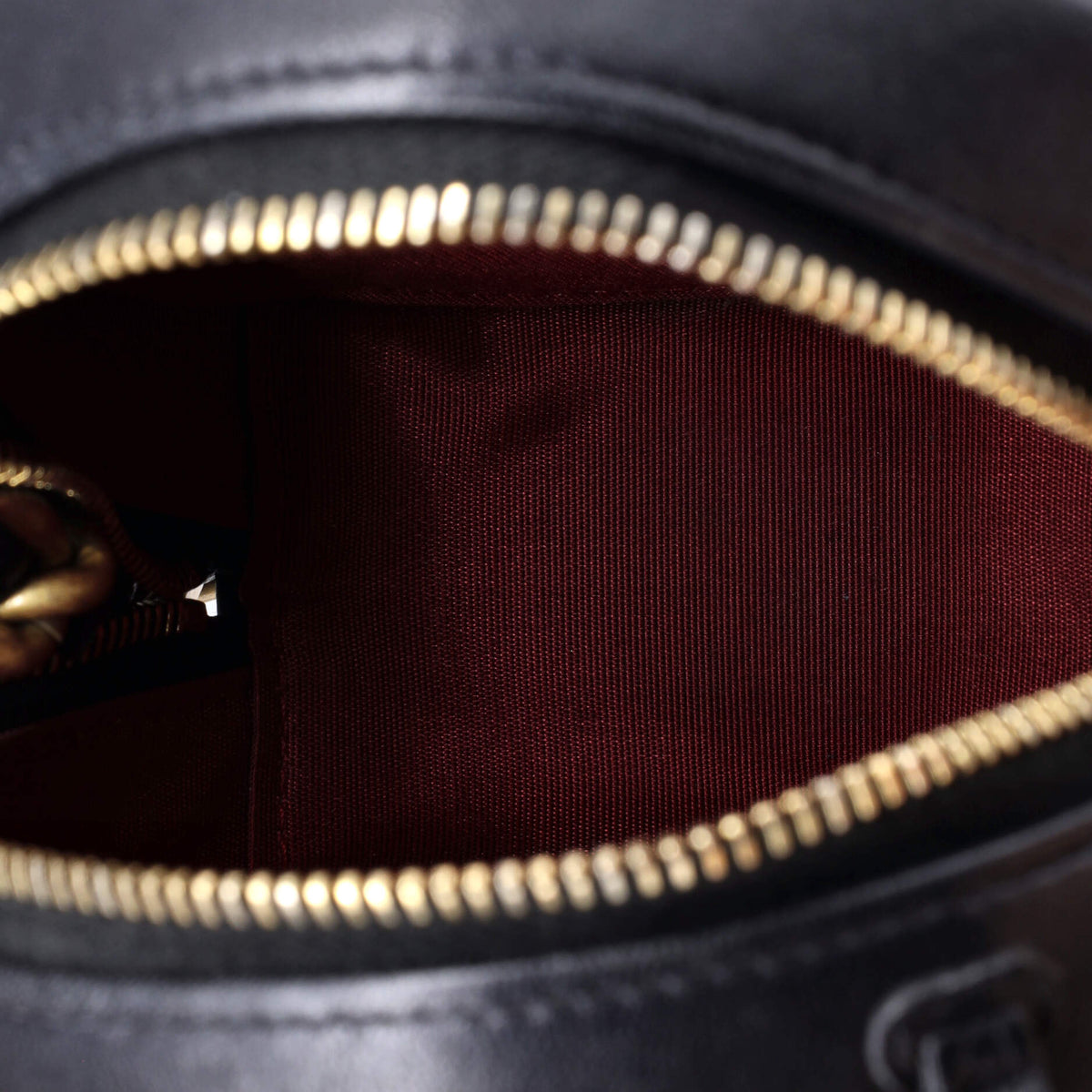19 Round Clutch with Chain Quilted Leather
