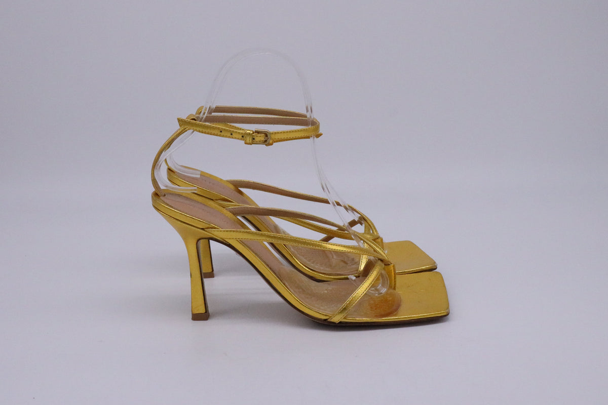 Bottega Veneta Stretch Ankle Strap Sandal Heels in Metallic Gold Leather