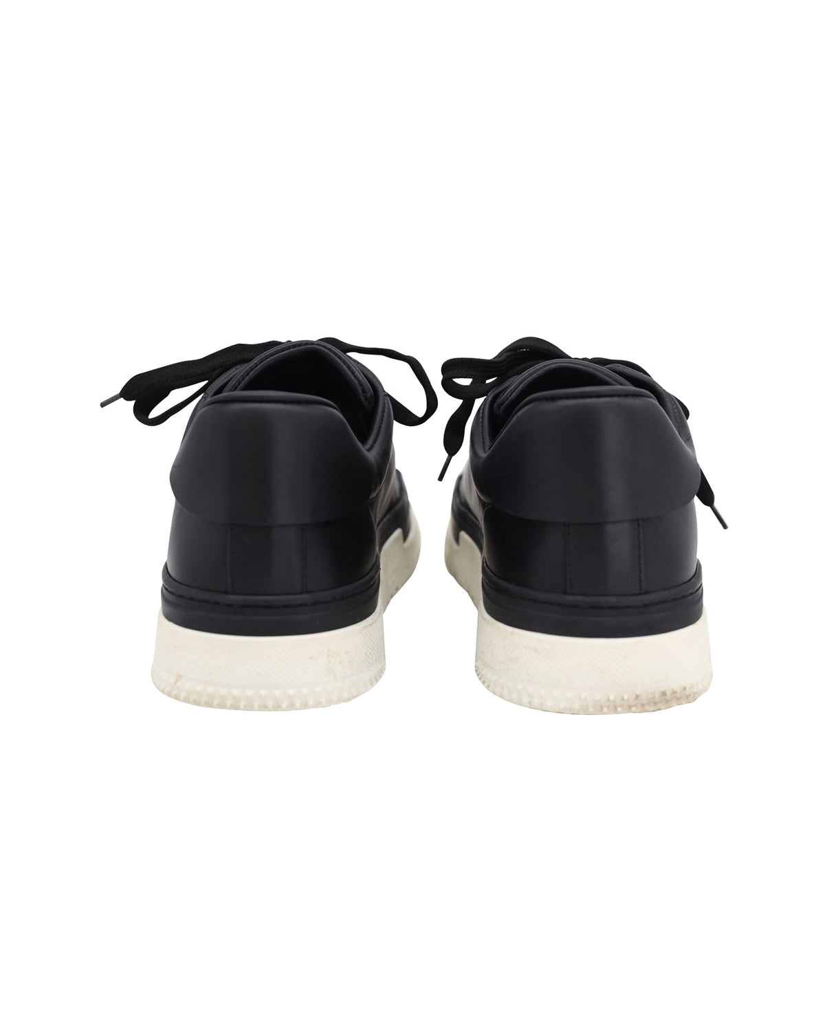 Valentino Garavani Low Top Sneakers in Black Leather