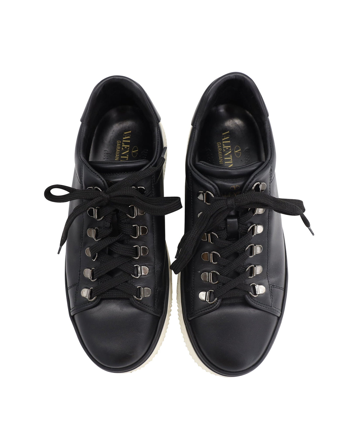 Valentino Garavani Low Top Sneakers in Black Leather