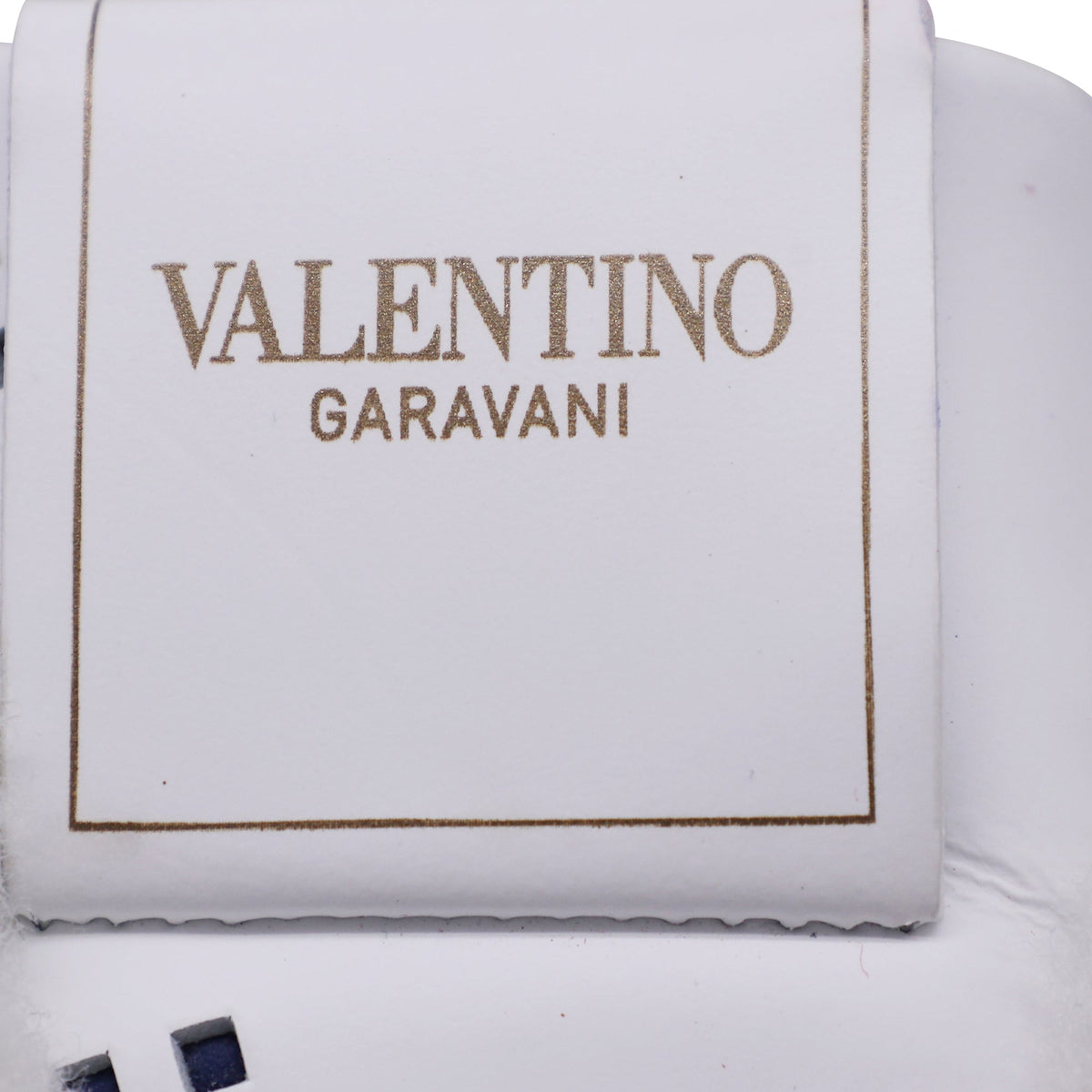 Valentino Garavani Backnet Perforated Shear-Lined Sneakers in White Leather