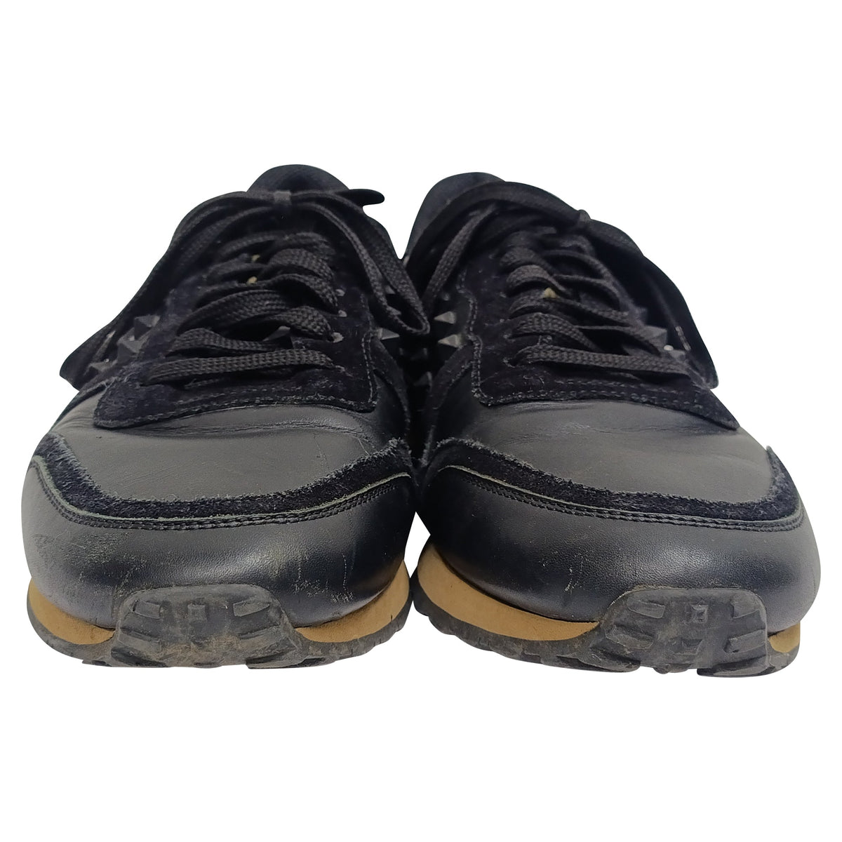 Valentino Garavani Rockrunner Low-Top Sneakers in Black Calf Leather