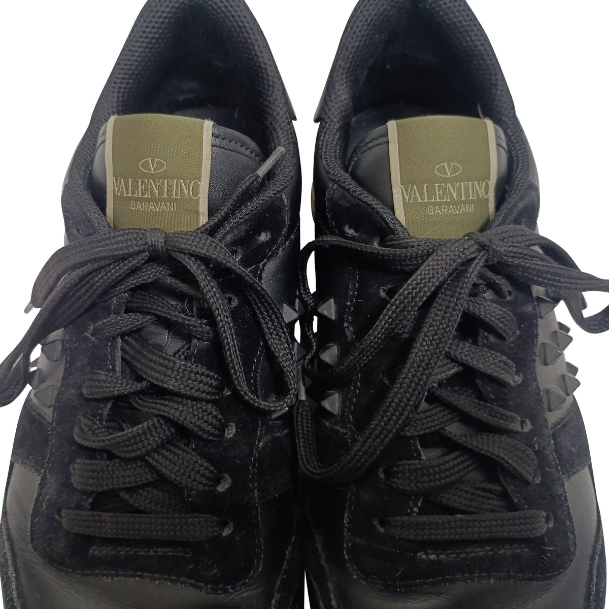 Valentino Garavani Rockrunner Low-Top Sneakers in Black Calf Leather