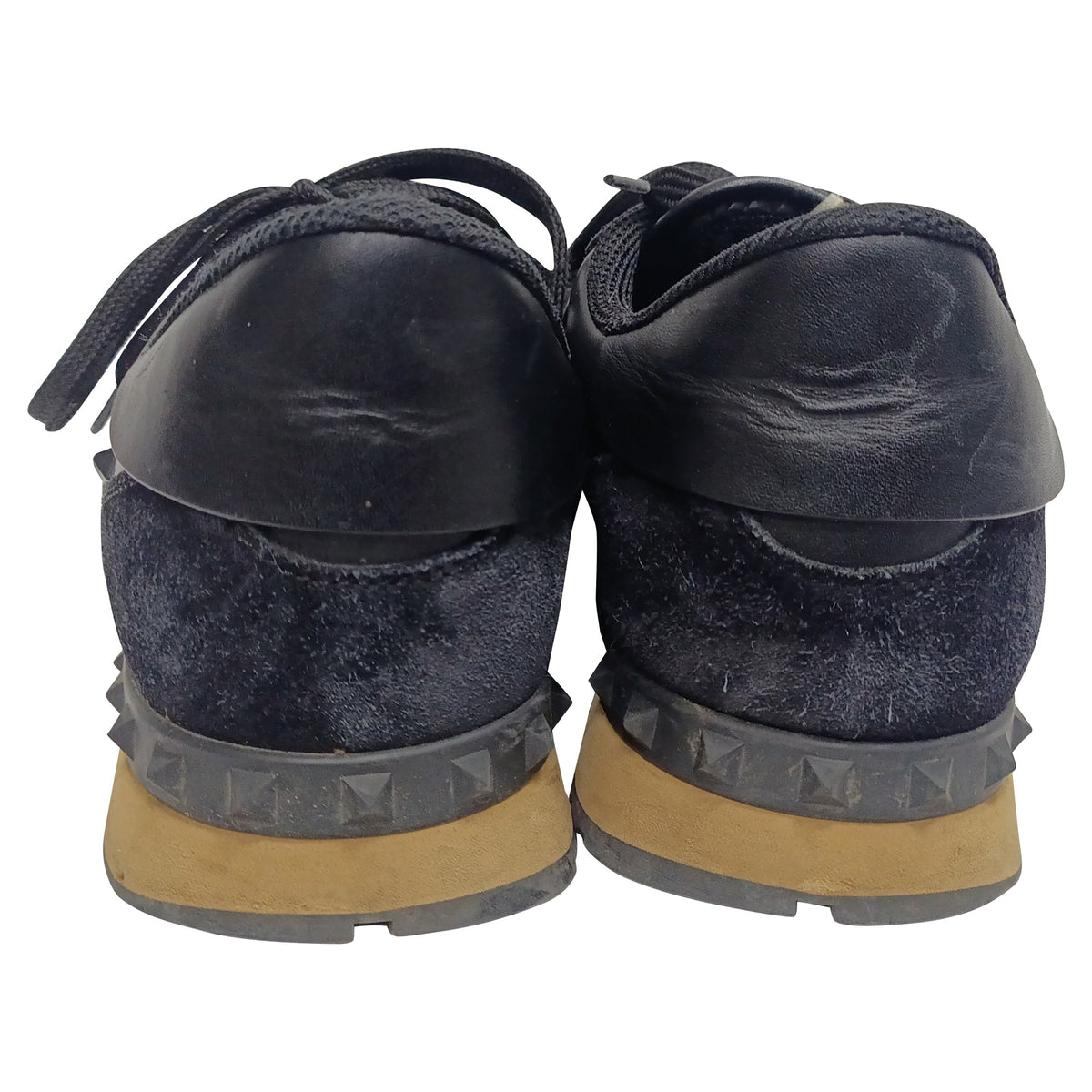 Valentino Garavani Rockrunner Low-Top Sneakers in Black Calf Leather
