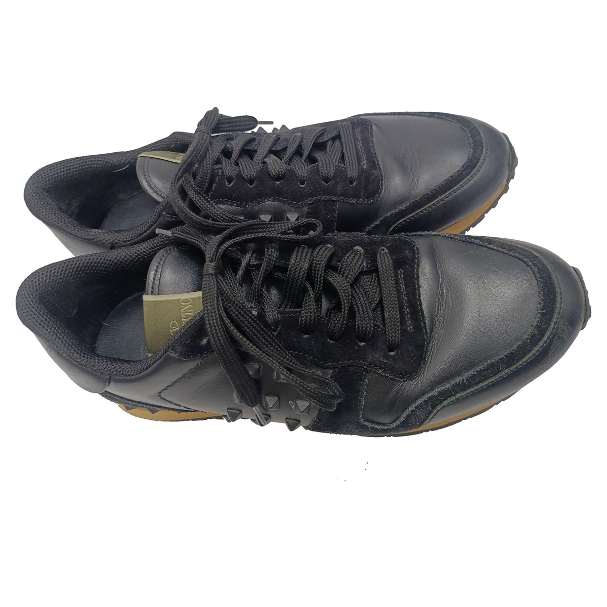 Valentino Garavani Rockrunner Low-Top Sneakers in Black Calf Leather